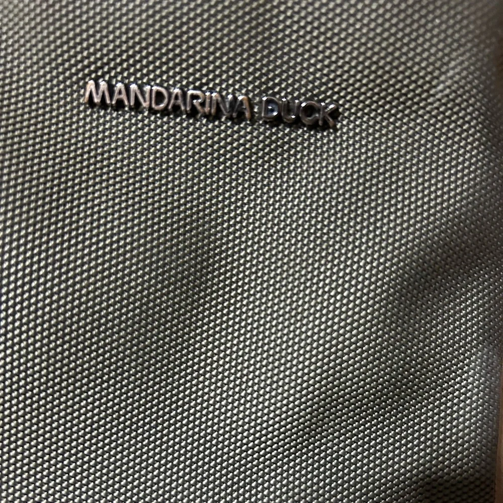 MANDARINA DUCK Messenger Bag with Adjustable Strap and Water-Resistant Finish